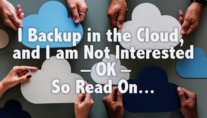 Title image for the blog with hands in the background holding cut outs of clouds and the title of the blog I back up in the cloud, now I'm not interested – OK – so read on…