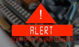 image of a red triangle in front of computer mother board with the words ALERT